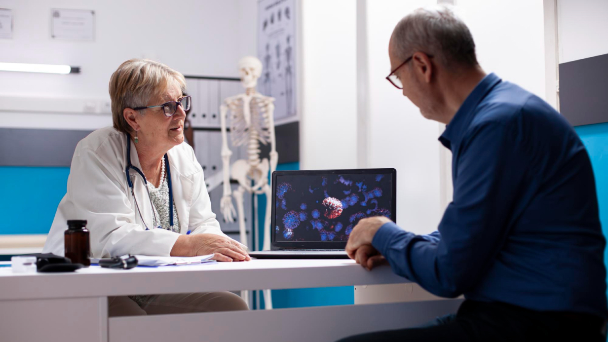 Doctor consulting with patient about personalized pharmacogenetic treatment in a contemporary medical office